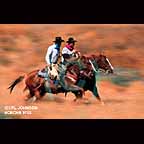2 Cowboys on horseback